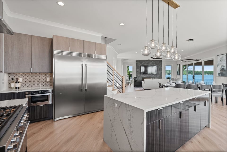 Enjoy the fully stocked kitchen to prep all your group meals with large island.