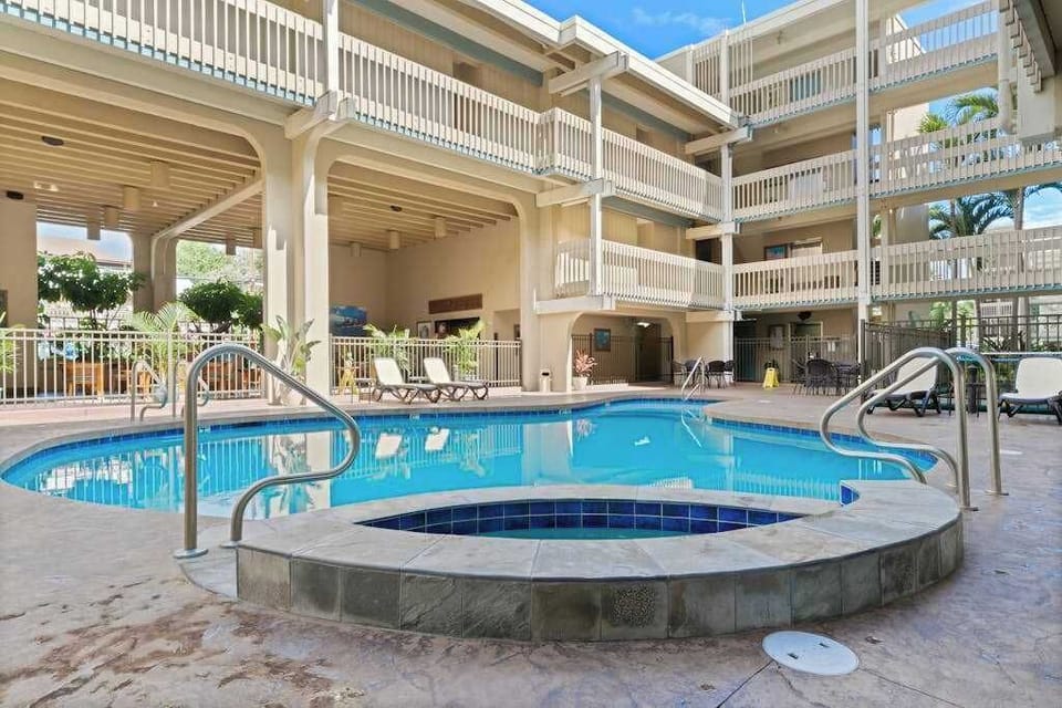 Soak Up The Sun At The Community Pool And Spa