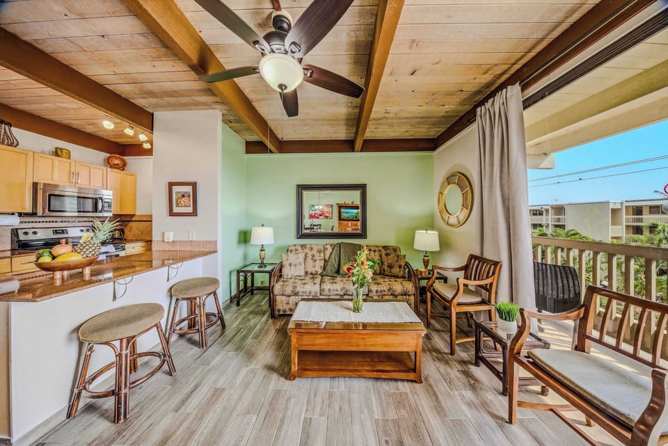 Bright Open-Concept Living Filled With Warm Island Charm