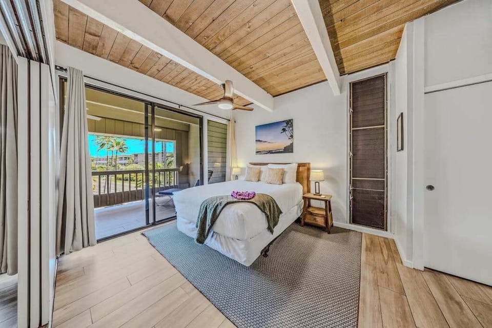 Wake Up To Tropical Views From Your Comfortable Queen-Size Bed