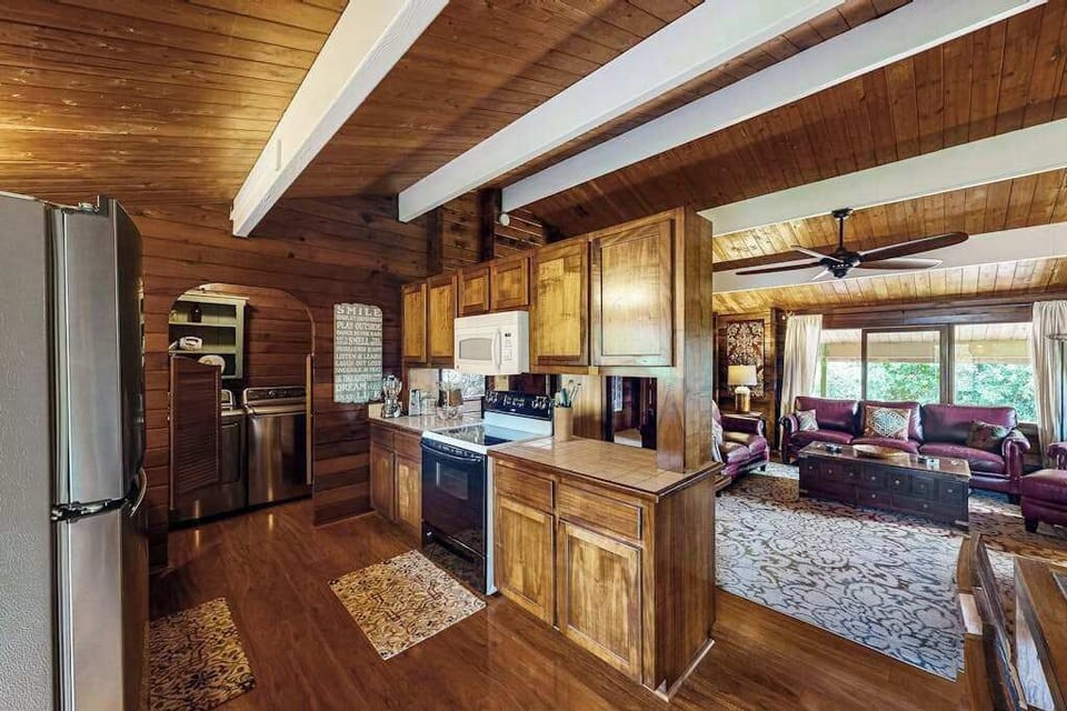While there are excellent dining options within a short drive, the full kitchen offers the opportunity to cook an al fresco meal to enjoy together on the custom dining table or backyard lanai.