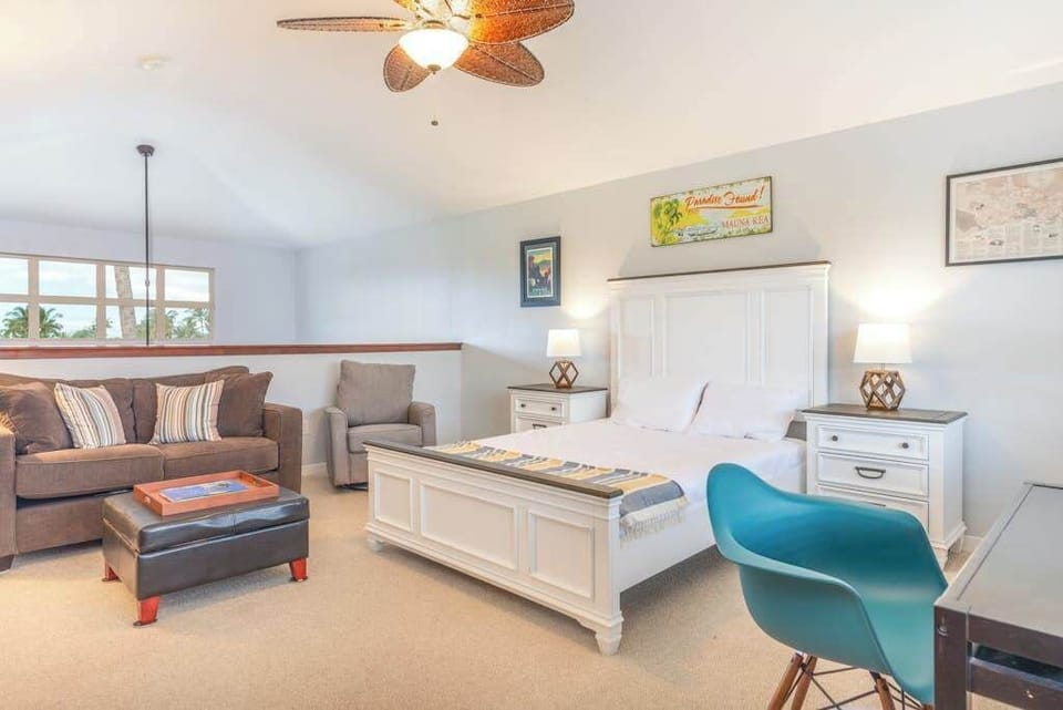 Extra guests no problem - queen beed located in the loft open to the living room downstairs.   Lots of space to relax on the sofa or a desk for any other items that need to be handled.