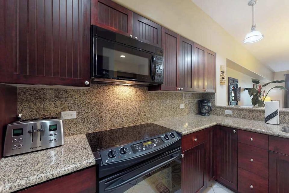 Fully equipped kitchen with modern appliances
