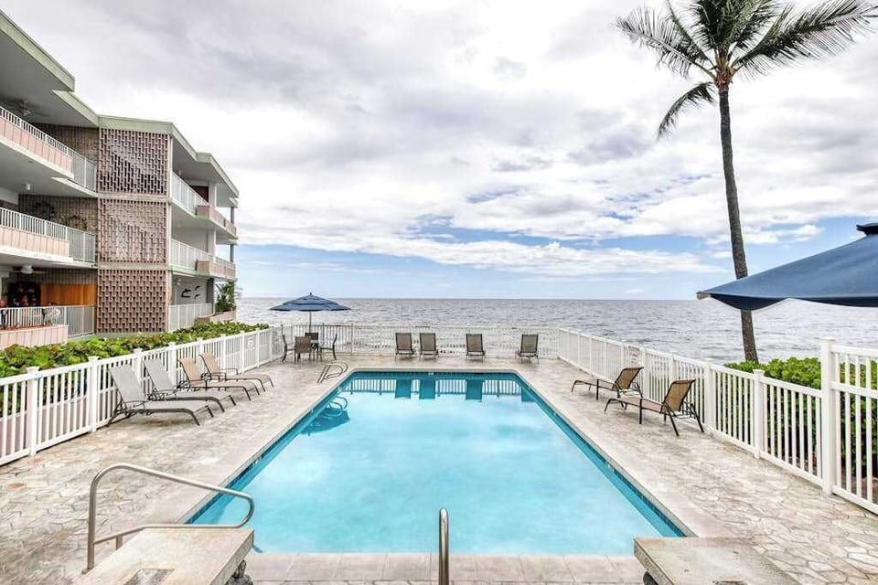 Oceanfront Pool Deck with Lounge Chairs overlooking the Pacific Ocean