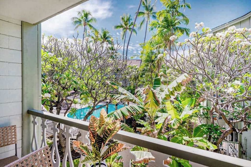 Balcony Surrounded By Tropical Greenery