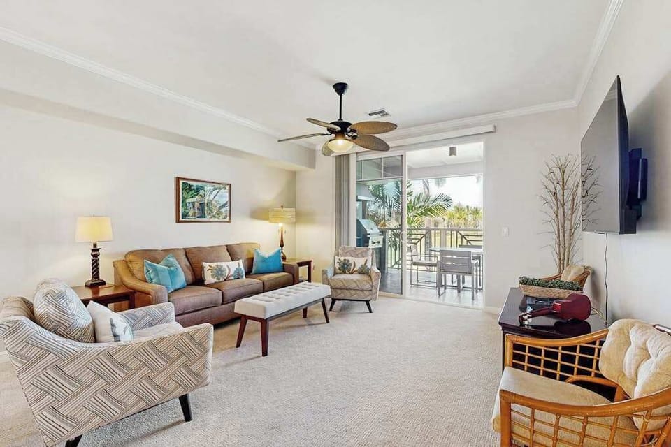 Bright living room with lanai access