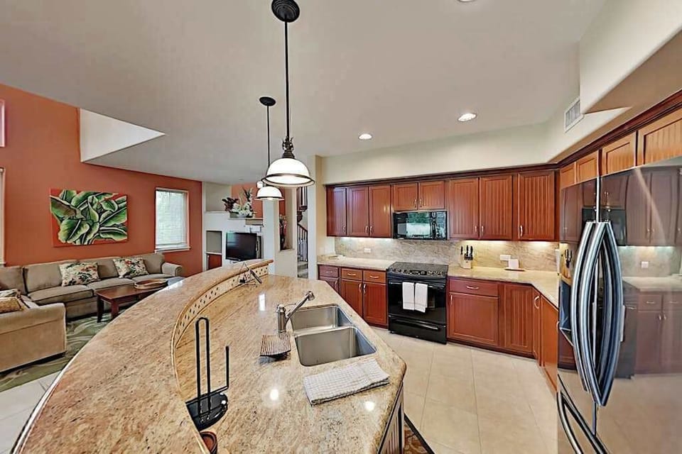 Large open state of the art and fully stocked kitchen.