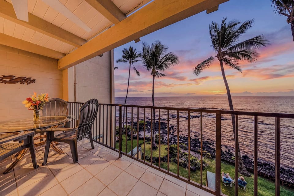 Sip A Drink As The Sun Sets Over The Ocean