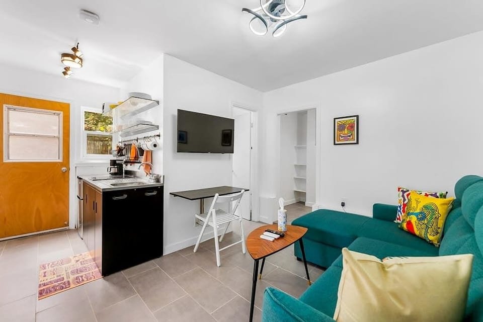 Open studio design makes relaxing and dining feel effortless