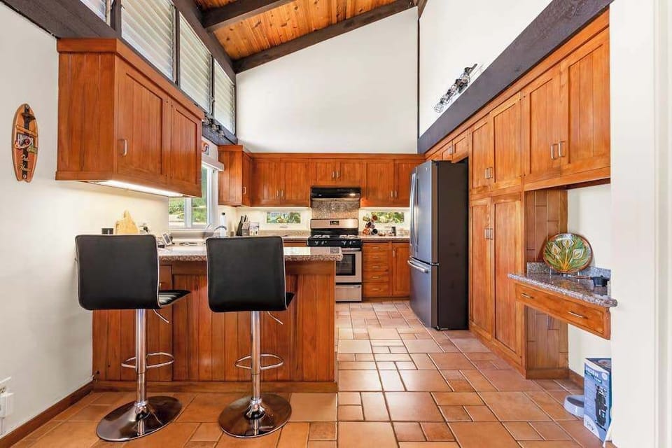 Full Kitchen with appliances and room for meal preparation