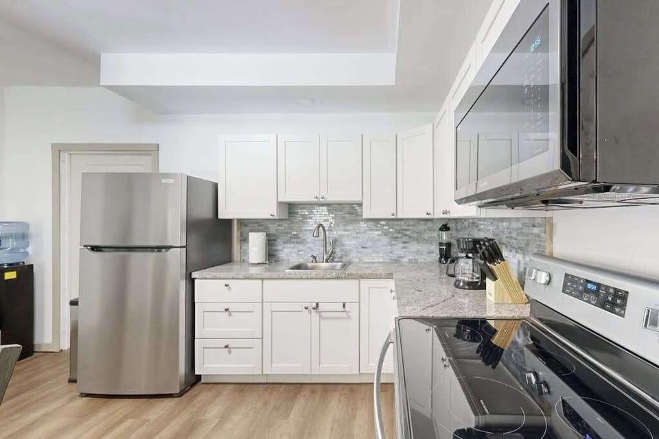 Prepare your favorite meals with ease in a fully equipped kitchen designed for your convenience.