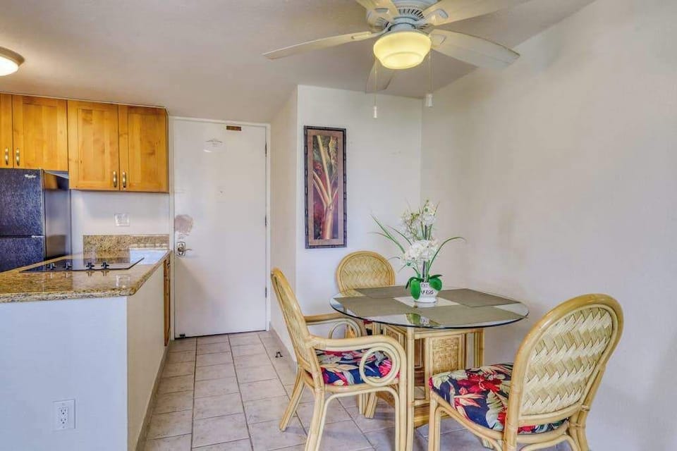 Open-concept dining space connects seamlessly to the fully equipped kitchen for added convenience.