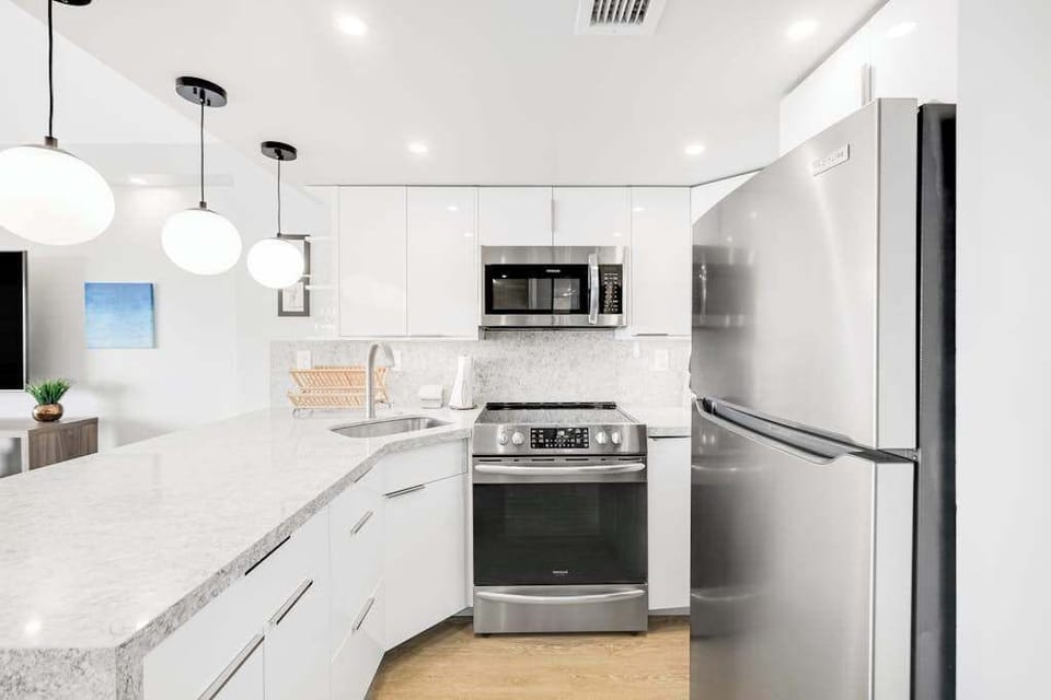 Enjoy a beautifully lit kitchen designed for slow breakfasts and shared dinners.