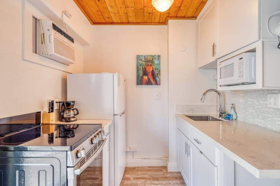 Cook, gather, and enjoy casual dining in this inviting kitchen space.