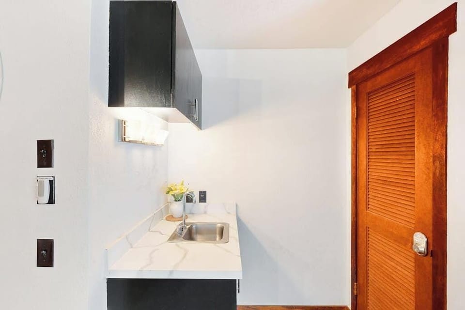 Compact kitchenette for easy meal preparation
