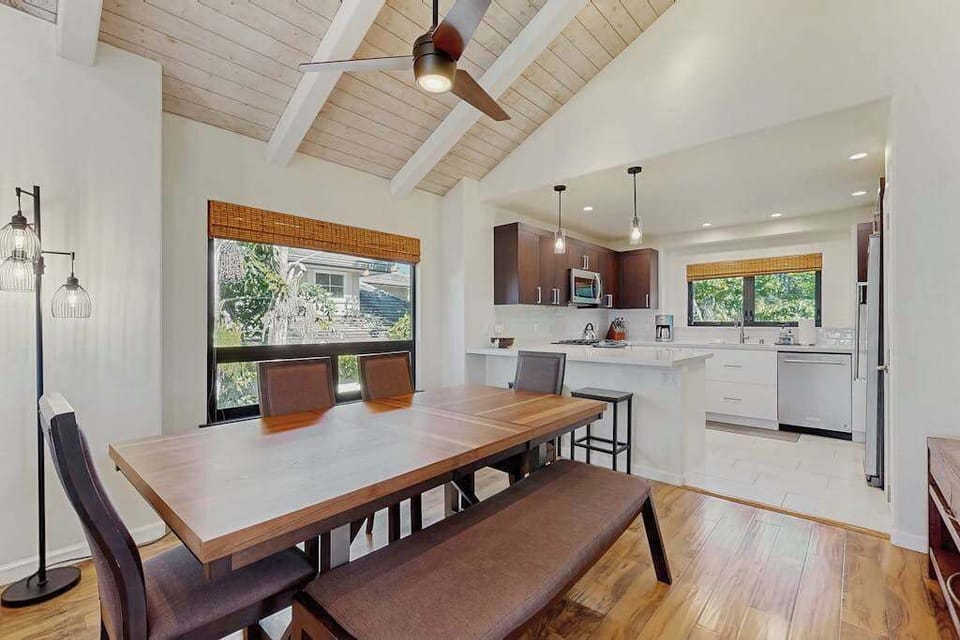 Gather Around The Spacious Dining Table