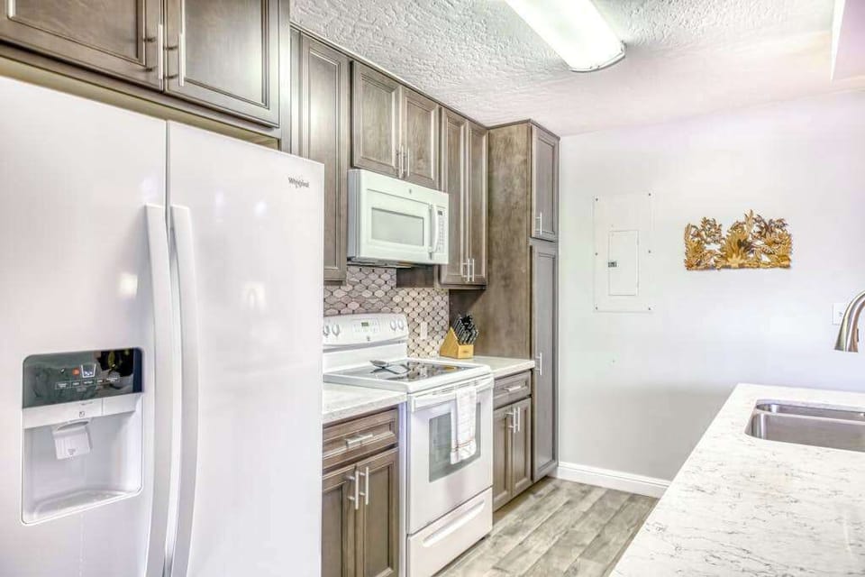 Modern Kitchen With Warm Wood Cabinetry