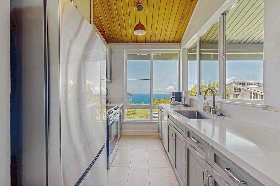 Newly remodeled kitchen with stainless steel appliances.