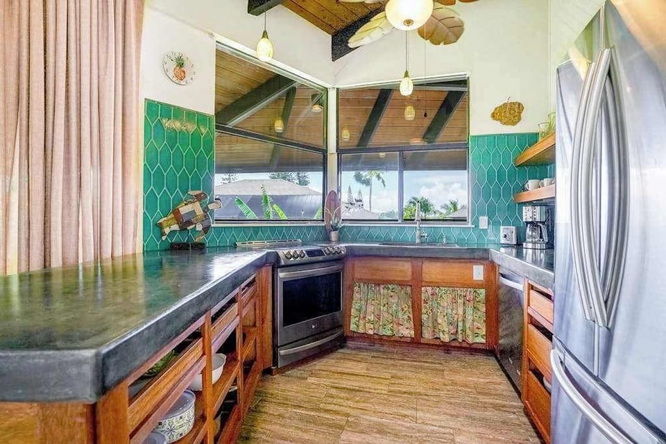 Well-appointed kitchen featuring modern appliances and ample counter space