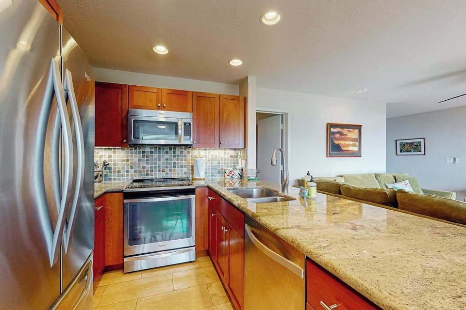 Bright kitchen provides practical workspace, cooking equipment, and organized storage