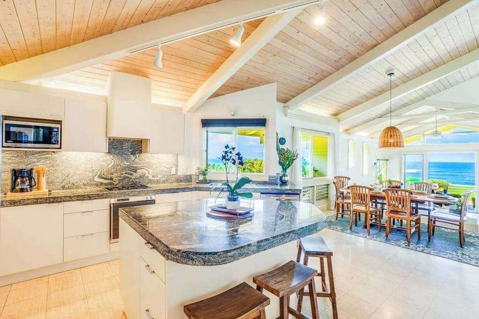 Spacious kitchen with dining access for shared meals