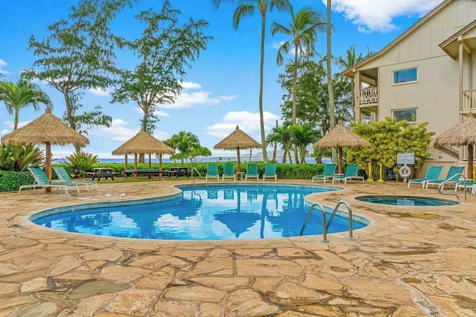 Refreshing pool surrounded by palms
