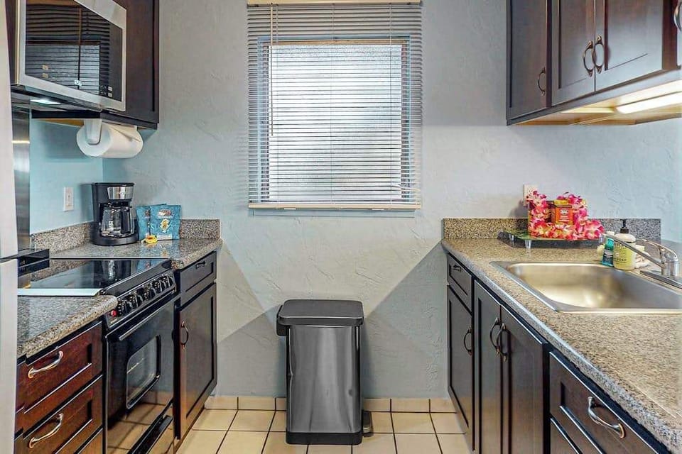 Full remodeled kitchen with new stainless steel appliances.