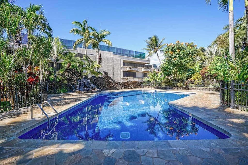 Resort Pool Oasis Beneath Swaying Palms