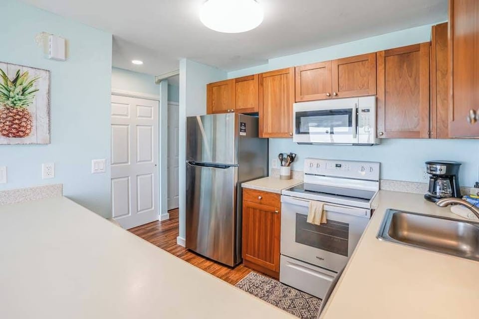 Modern Kitchen With Warm Wood Cabinetry