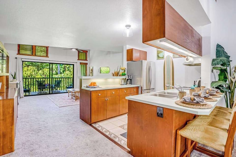 Four barstools for extra seating at the kitchen counter. 