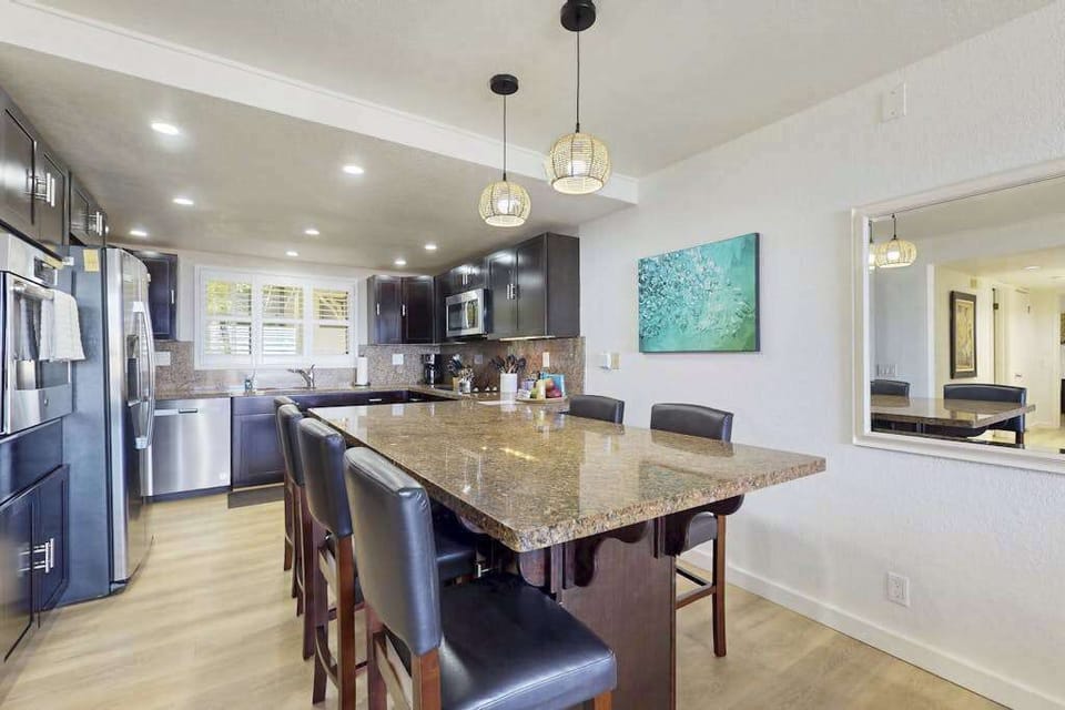 Massive Granite Breakfast Island Designed For Entertaining