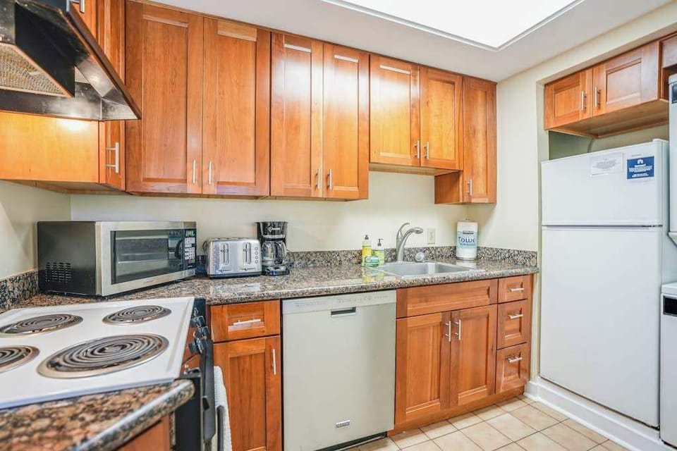 Cook delicious meals in this warm and functional kitchen space