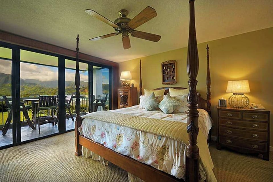 Wake up refreshed in this inviting bedroom with outdoor views