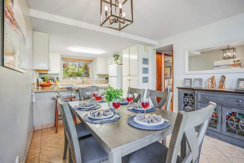 Dining space flows directly into the modern kitchen, keeping everyone connected