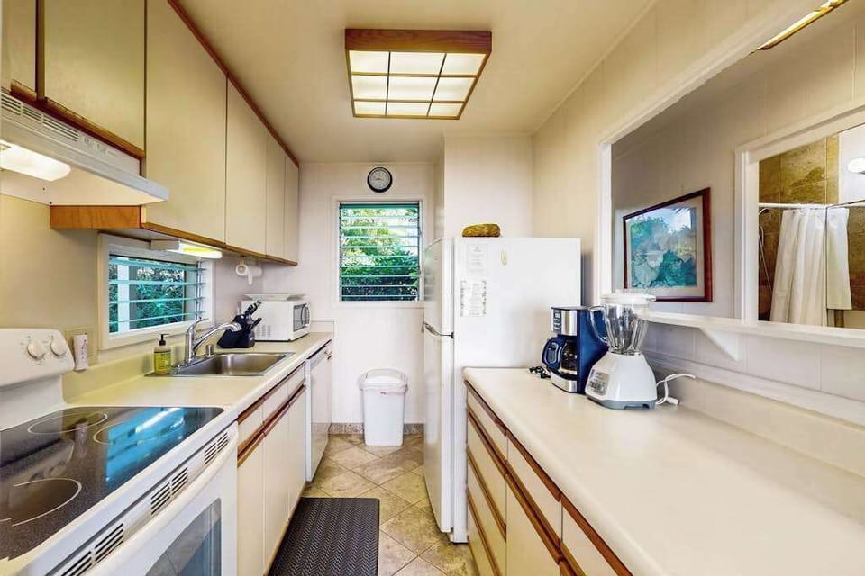 Bright kitchen equipped with everything needed for home-style cooking.