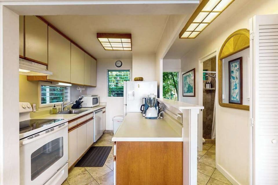 Well-designed kitchen with generous counter space for easy meal preparation.