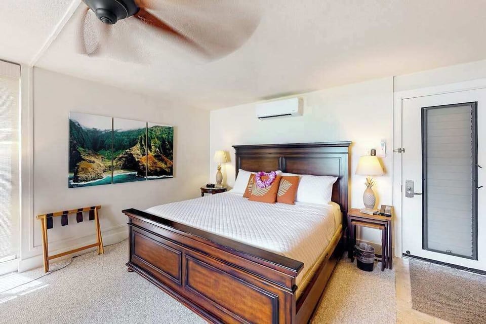 Rest and recharge in this welcoming bedroom after exploring paradise