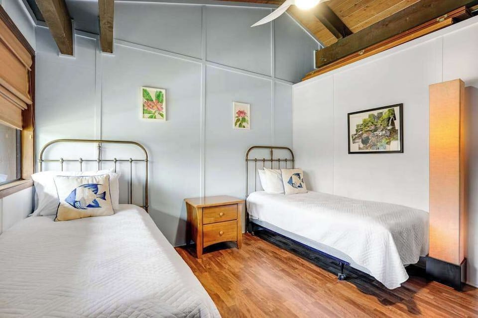 Guest bedroom featuring two twin beds.
