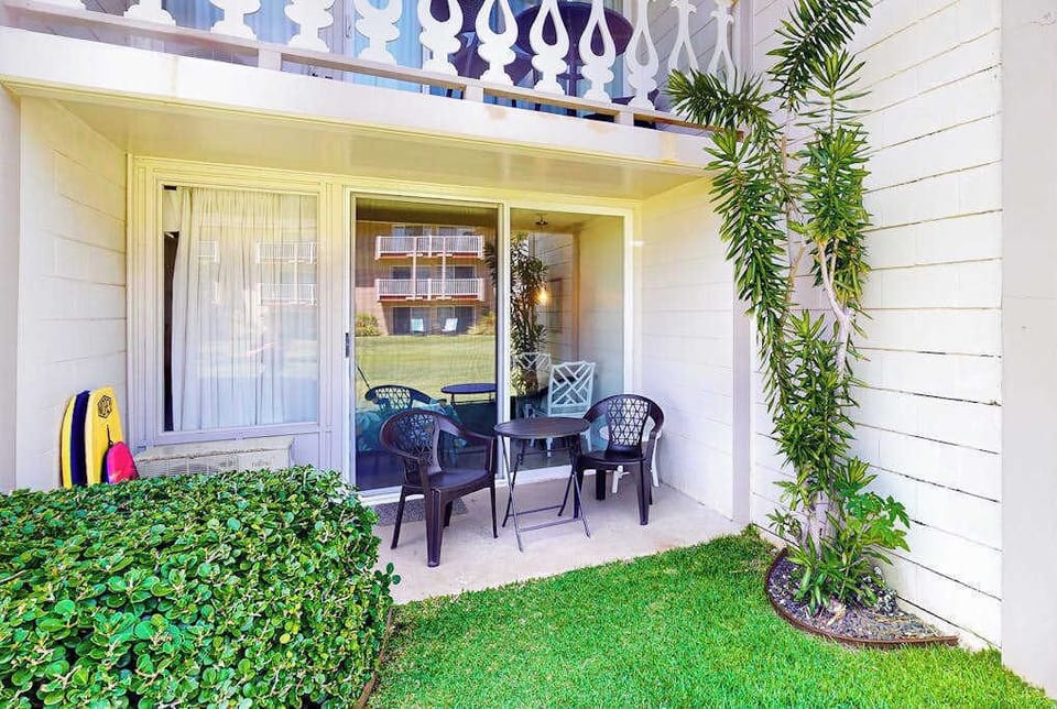 Private ground-floor lanai with outdoor seating.
