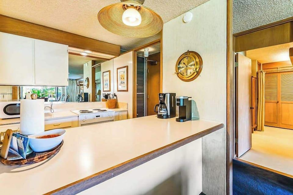 The breakfast bar creates the perfect spot for coffee or a quick bite.