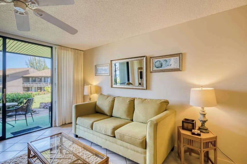 Living room with comfortable sofa bed for extra guests convenience.