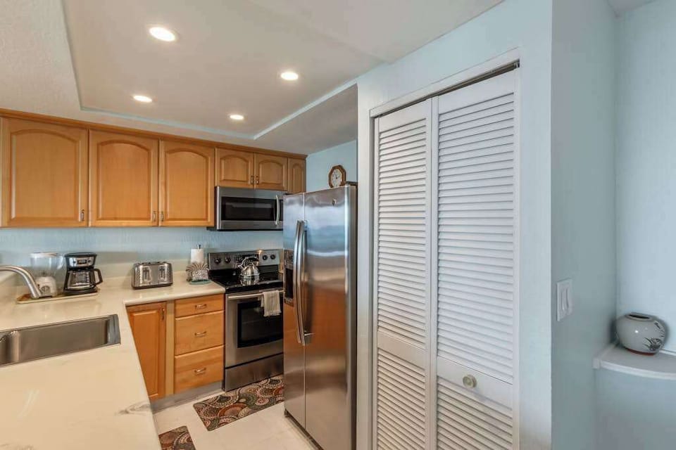 The home features several renovations including new finishes and an upgraded kitchen with stainless steel appliances and gleaming countertops - here, you'll have all you need for cooking delicious meals. 