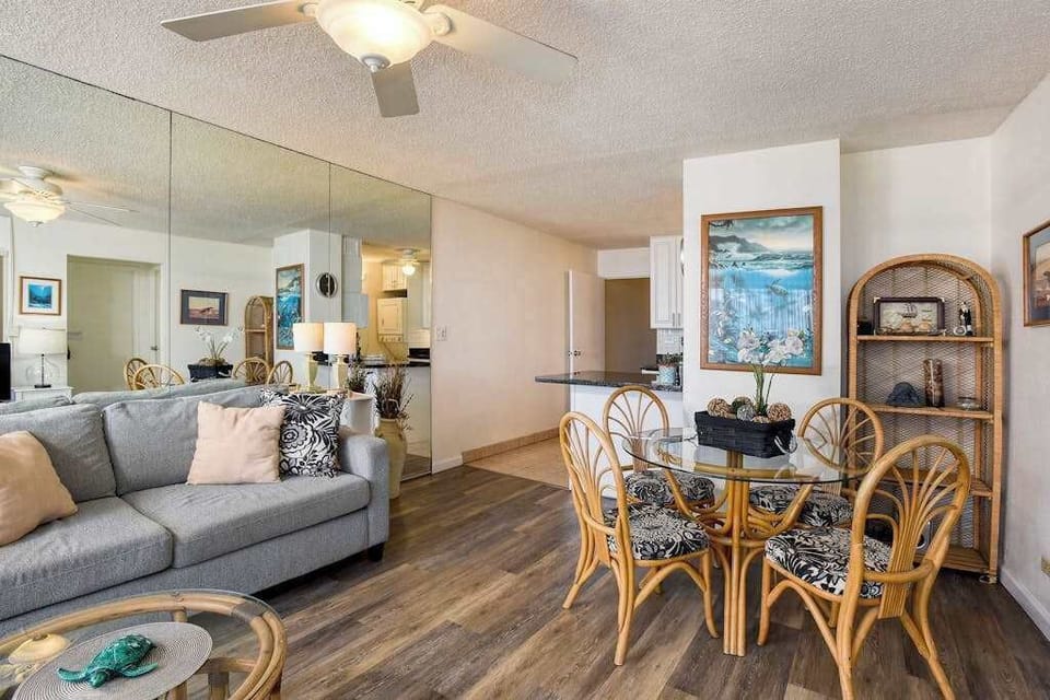 Dining room with seating for four, enjoy a great family dinner from the comfort of your condo.
