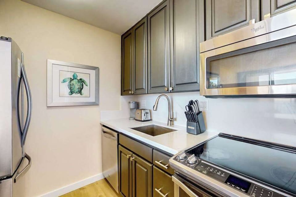 Newly updated kitchen with new stainless steel appliances.  