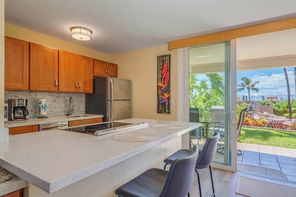 Modern kitchen featuring full-size appliances and ample counter space.