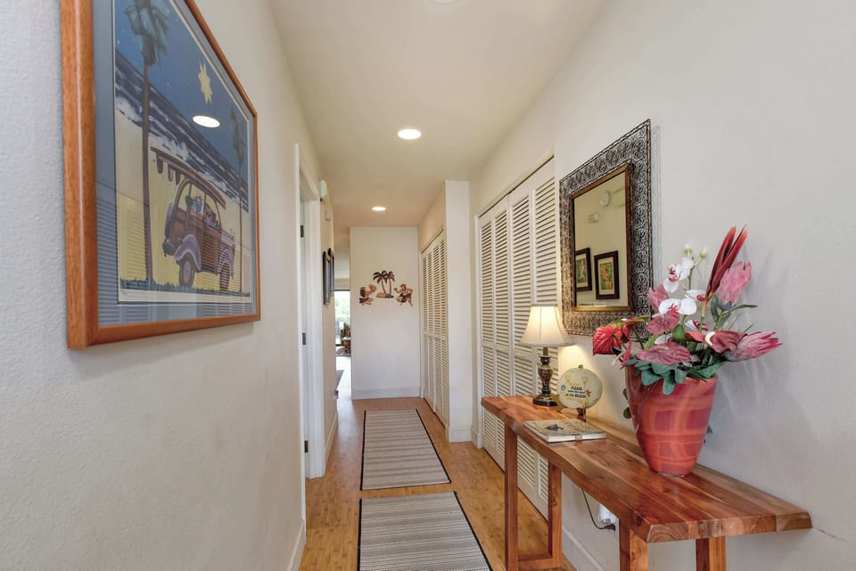 Bright Hallway Leading To Bedrooms