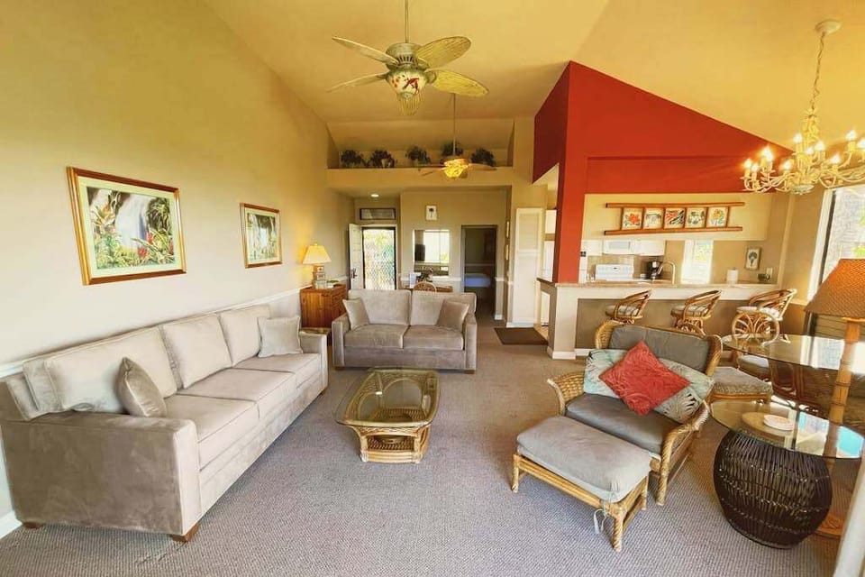 Vaulted Living Room Space with Plush Sofa Seating & Breakfast Bar