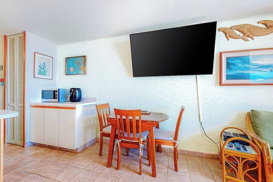 Dining room table for private dinners in and a flat screen tv for your entertainment.