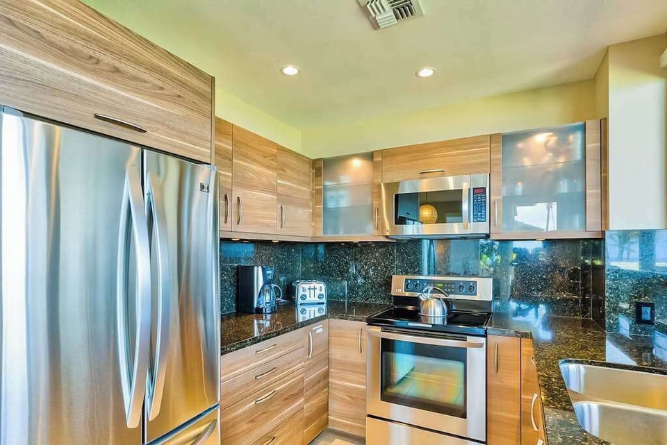 Fabulously remodeled new kitchen with stainless steel appliances and granite countertops.