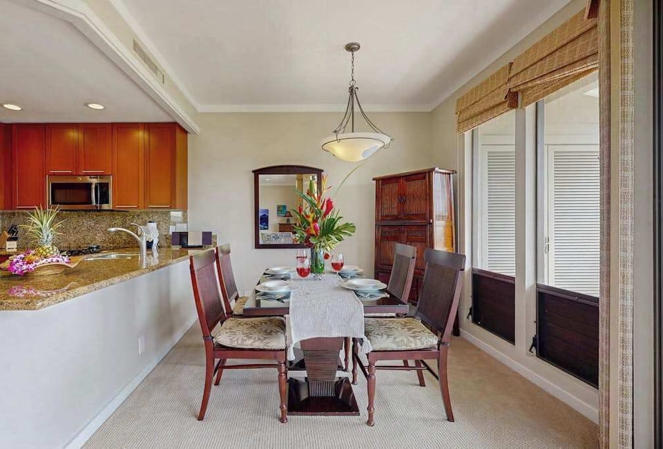Dining room next to pictruesque windows so that you can enjoy a view while you eat.
